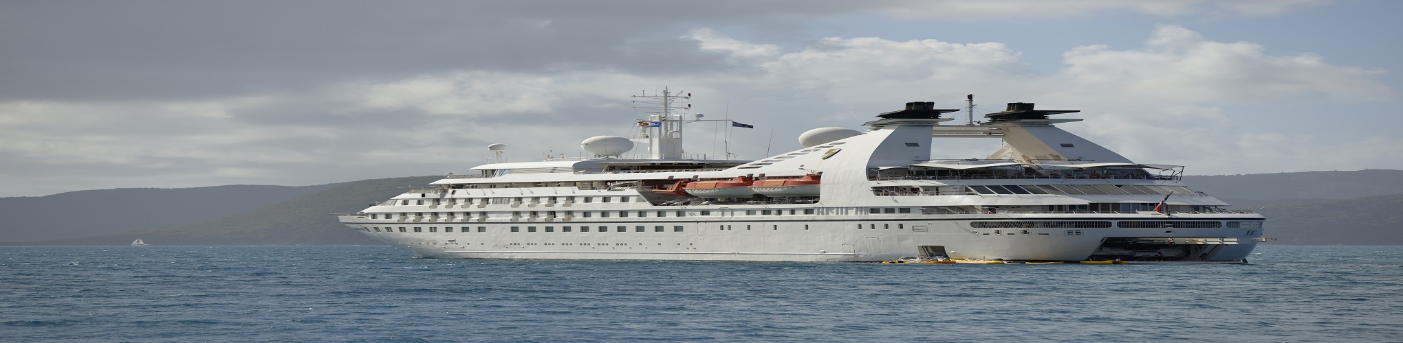 British Virgin Islands, Jost Van Dyke. Seabourn Pride is one of three German built cruise ships, built and operated for Seabourn Cruise Line